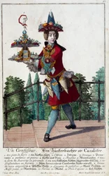Le confiseur : un jeune homme tenant un plateau de bonbons et de confiseries. Gravure de Martin Engelbrecht (1684-1756) 18ème siècle. Paris, Arts décoratifs