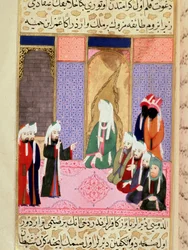 Le prophète Mahomet, le visage couvert, probablement en conversation avec son compagnon Omar ou Omar Ier, surnommé Al-Farouq (Al Farouq ou Faruq). Miniature tirée du poème épique «Siyer-i Nebi» (Siyer i Nebi), racontant la vie du prophète Mahomet