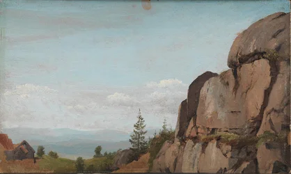 Paysage norvégien avec rochers au premier plan