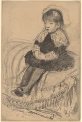 Enfant assis sur un canapé