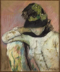 Jeune femme au bonnet noir et vert, regardant vers le bas