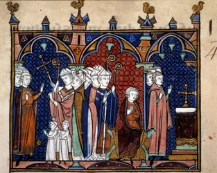 Ordre du sacre et du couronnement des rois de France : arrivée du roi dans la cathédrale, le roi assis sur son trône, évêques, moines et clercs. Miniature tirée de « L