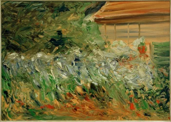 Massifs de fleurs à la maison du jardinier