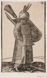 Soldat corpulent debout, avec la main droite dans la poche, tourné vers la droite; deux plumes dans le turban; épée à gauche, bouclier avec plume sur le bras gauche; massue et lance croisées sur le sol devant lui