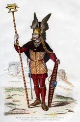 Chef gaulois en tenue de bataille portant un étendard