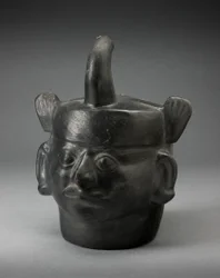Vase à portrait en forme de règle portant une coiffe féline