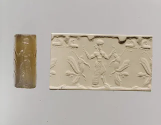 Sceau-cylindre et impression moderne : figure masculine dominant des lions ailés à tête humaine, vers 8e-7e siècle av. J.-C. (calcédoine)