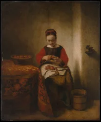 Jeune femme épluchant des pommes