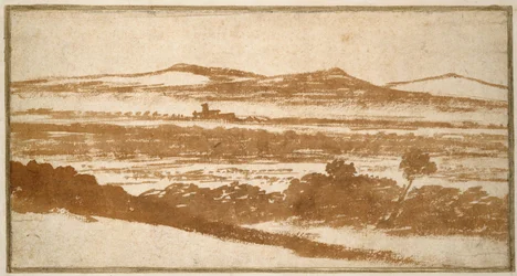 Vue à travers une vallée vers des collines lointaines