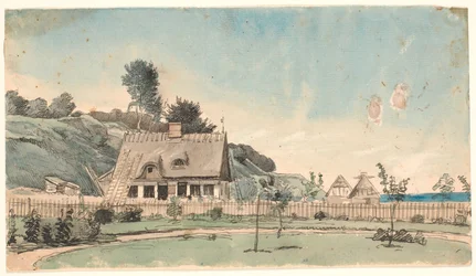 Paysage côtier avec maisons au toit de chaume