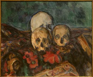 Trois crânes sur un tapis oriental