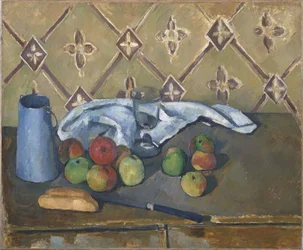 Fruits, serviette et pot à lait