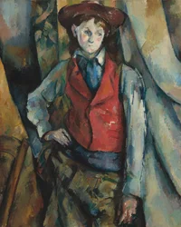 Garçon avec un gilet rouge