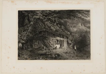 Chaumière normande avec les ruines du château d