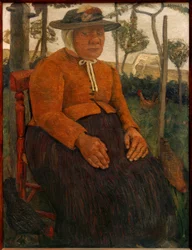 Vieille femme pauvre assise dans le jardin