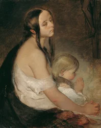 Mère avec enfant sous le crucifix