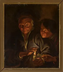 Vieille femme et garçon avec une bougie