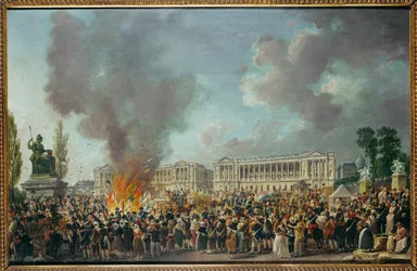 Les emblèmes de la monarchie sont brûlés sur la place de la Concorde ...