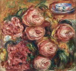 Composition avec des roses et une tasse de thé
