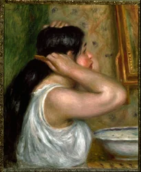 La toilette : femme se peignant
