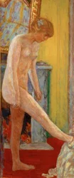Jeune fille nue devant la cheminée