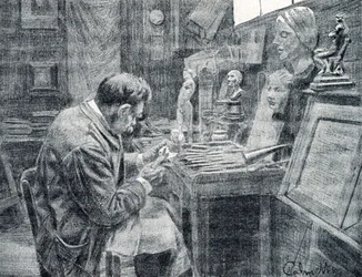 Ouvrier ivoirier sculptant l