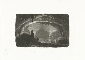 Homme avec une barque dans les grottes de Han