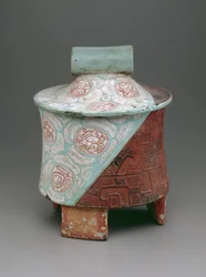 Vase tripode avec pieds en dalle