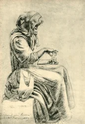 Femme assise avec des cartes à jouer