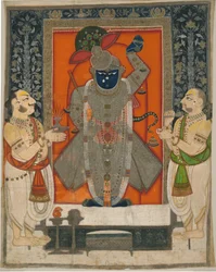 Prêtres adorant Krishna en tant que Shrinathji pour le festival de la Montagne de Nourriture [Annakuta utsava]; tenture de sanctuaire [pichhavai]