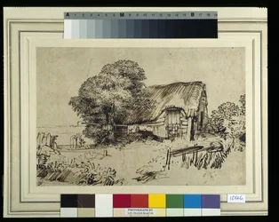 Un cottage au toit de chaume près d