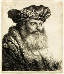Homme barbu avec un bonnet de velours avec fermoir à bijou