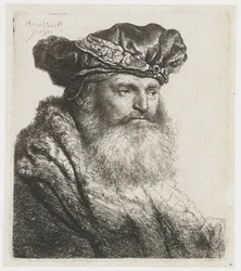 Homme barbu avec un chapeau de velours et une attache ornée de bijoux