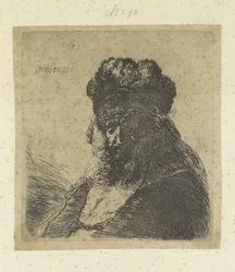 Vieil homme barbu avec un bonnet en fourrure et les yeux fermés