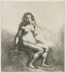 Femme nue sur un monticule