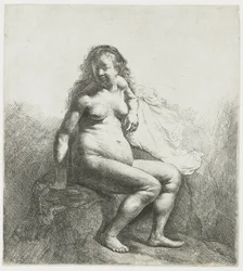 Femme nue sur une butte