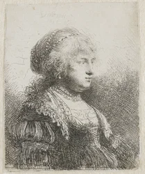 Saskia avec des perles dans les cheveux