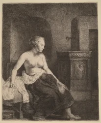 Femme à demi-nue assise près d