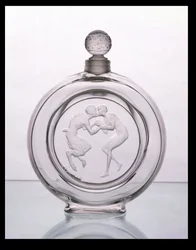 Le Baiser du Faune, flacon de parfum en verre clair pour Molinard par Lalique