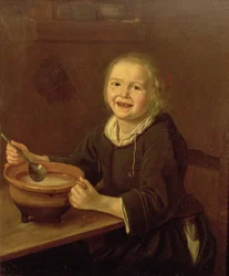 Garçon mangeant du porridge