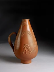 Cruche piriforme avec décoration appliquée de léopard ou guépard attaquant un condamné, Pan ivre violant une ménade