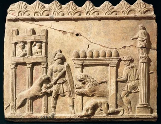Relief romain représentant des lions et des gladiateurs combattant dans le cirque