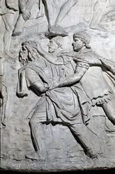 Art romain : un soldat dace prisonnier des soldats romains. Moule de 1862 reproduisant les bas-reliefs de la colonne de Trajan à Rome construite sous le règne de l