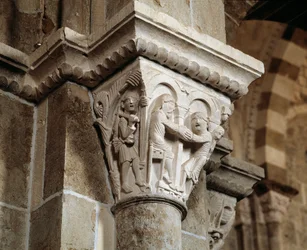 Ésaü revient de la chasse et se trouve devant son père Isaac qui bénit Jacob (chapiteau sculpté)