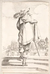 Homme vu de dos montant un escalier de trois marches