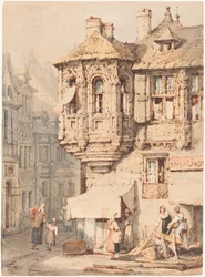 Scène de rue française avec une tourelle médiévale