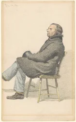 Homme assis sur une chaise Hitchcock