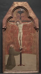 Saint François agenouillé devant le Christ sur la Croix