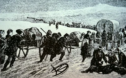 Convoi de chariots mormons dans une tempête de neige en direction de Salt Lake City, Utah