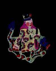 Dieu chinois chevauchant un dragon. Découpage de papier peint ou "Jian Zhi", art populaire chinois, Pékin.